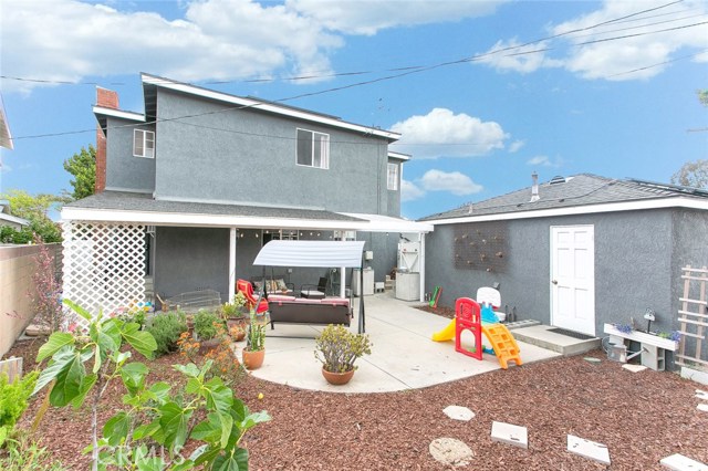 Fenced and semi-covered Patio and Backyard is perfect for family gatherings and playground for kids.