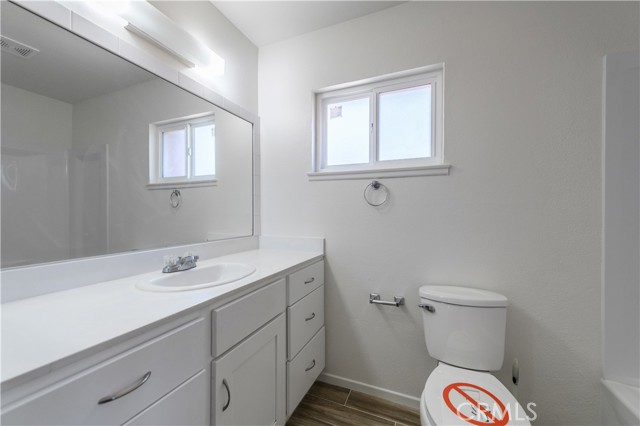 Master Bathroom with brand new vinyl title flooring