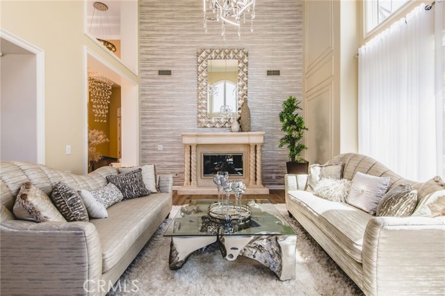 The formal living room has floor to ceiling windows. The formal living room has floor to ceiling windows.