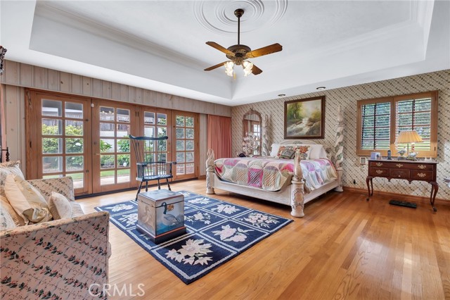 One of the family rooms. Those French doors open to rear garden, pool, spa, etc
