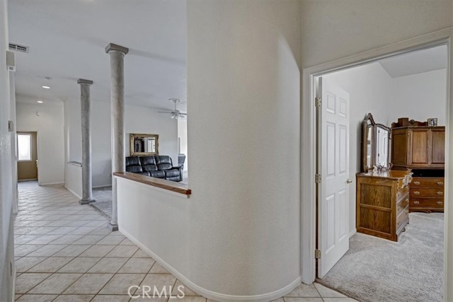 Entry Featuring The Family Room and Primary Bedroom.