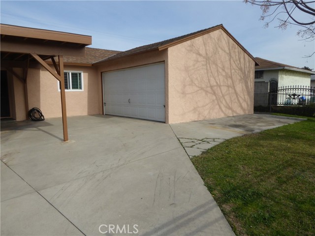 Driveway to the 2 Car Garage & Uncovered Parking Spot