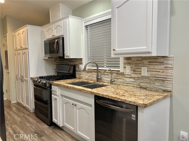 Detail Gallery Image 4 of 6 For 13181 Lampson Ave #112,  Garden Grove,  CA 92840 - 3 Beds | 2 Baths