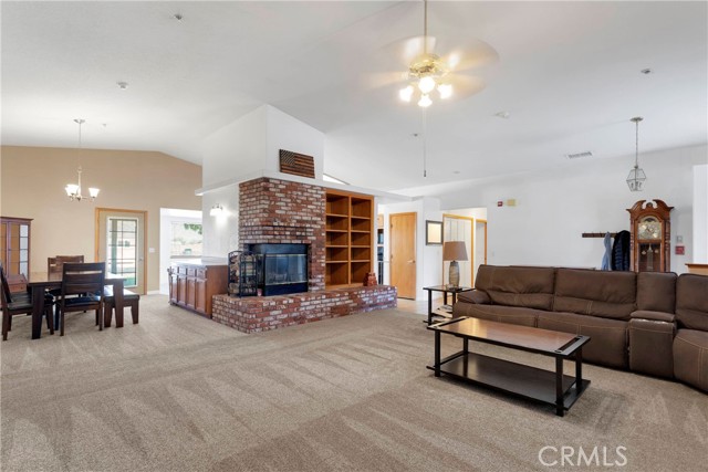 Front entry, Living room, fireplace and formal dining