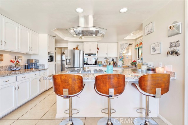 Remodeled kitchen is bright and open. Beyond the kitchen is a fantastic butler's pantry.