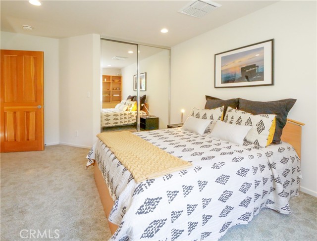 Second Bedroom with Mirrored Closet Doors