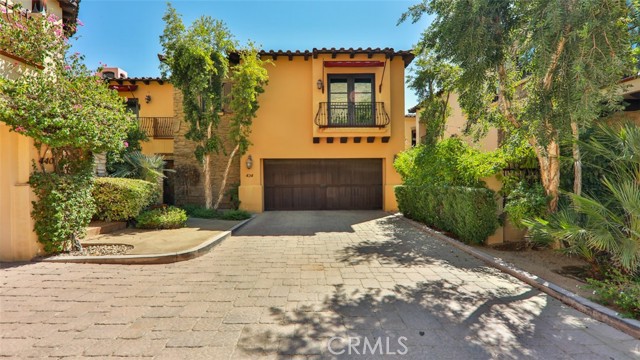 Live luxuriously in this highly sought after Tuscan style gated community known as The Villas of Old Palm Springs. Located in the heart of the city, you will fall in love with this over the top luxurious villa that is completely custom & is near all the action. A mere 5 minute walk to the Museum, Hiking Trail, The Rowan Hotel, The Spa Casino, and a close proximity to a vibrant downtown that offers a wide range of options to eat & shop. This villa is the prime location within this community as it sits w/a direct pool view & access. The interior is an absolute showcase to view featuring granite slab counter tops, quality cabinetry, high end stainless appliances, professional gas range, vinyl waterproof flooring, fresh paint throughout, several custom rock accent walls, recessed lighting, crown molding, & multiple custom fixtures throughout. There are two master suites both w/their own private terraces and en-suites offering custom finishes. Main floor bedroom has its own private patio & works well as an in law suite. Enjoy dramatic interior features w/soaring ceilings, multiple sets of french doors, multiple balconies & patios with close-up Mountain Views. The exterior Tuscan architecture of this home with its Mountain backdrop paired with cobblestone streets make you feel like you're in Italy. A rare Downtown Luxury offering; two association heated pools, three spas, outdoor BBQ & a Bocce Ball Court. You're expectations will be exceeded. Furniture may be purchased separately