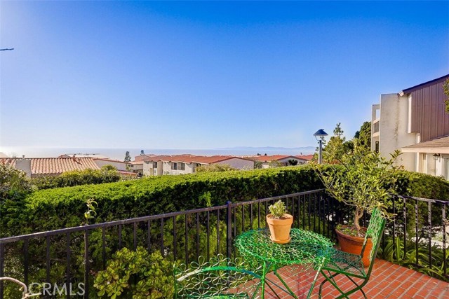 28301 Ridgehaven Court 75 Rancho Palos Verdes, California Grab your favorite drink and relax in the comfort of your favorite chair as you watch the Summer sunsets! Nestled on the highest peak of the Mira Verde community, this 2-bedroom condo has been tastefully upgraded and is ready for you to move in. The split-level unit features an open floor plan which flows from the living room to the dining area and kitchen. Entering the front door, the living room is highlighted by a captivating ocean view, custom designed stone and quartz fireplace, and high ceilings. StGrab your favorite drink and relax in the comfort of your favorite chair as you watch the Summer sunsets! Nestled on the highest peak of the Mira Verde community, this 2-bedroom condo has been tastefully upgraded and is ready for you to move in. The split-level unit features an open floor plan which flows from the living room to the dining area and kitchen. Entering the front door, the living room is highlighted by a captivating ocean view, custom designed stone and quartz fireplace, and high ceilings. Stepping outside, the private patio has stunning panoramic ocean views up to Malibu. Like to cook? You're gonna love the abundance of granite countertop space in the kitchen along with an additional prep sink and ample storage within the custom cabinets. Located on the top level, the master suite is graced with hardwood floors and a generous walk-in closet. Travertine tiles, dual sinks, and a soothing whirlpool tub adorn the master bathroom. This end unit is surrounded by lush landscaping and walking paths that lead to wonderful amenities including a pool, tennis and basketball courts, and an outdoor BBQ area. Come on over and take a look for yourself before it's gone. Buyer and Buyer's Agent to confirm all information to their satisfaction.