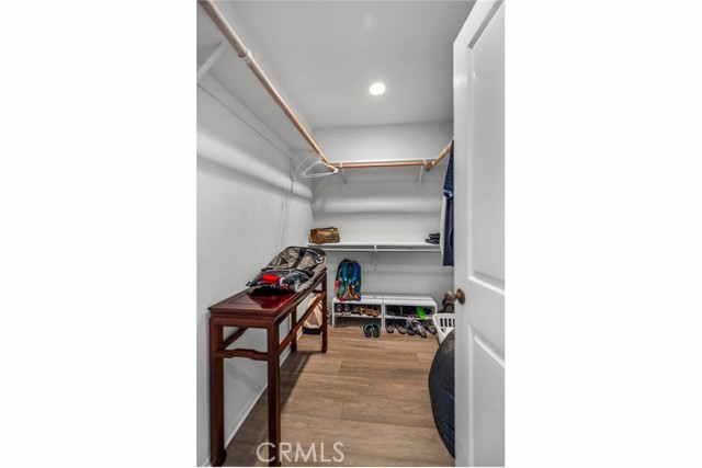 Primary bedroom walk-in closet