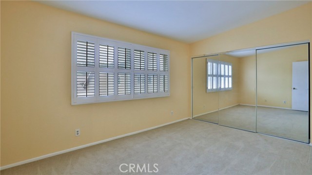 Upstairs Bedroom # 1, Window, Shutters, Mirrored Closet Doors