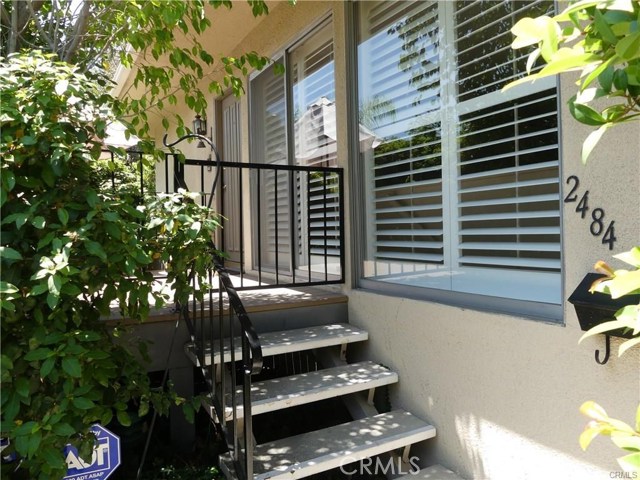 2484 E Mountain Street Pasadena, California This charming condominium is located in the highly desirable Mountain Park Villas in Pasadena. The residence has been lovingly maintained and shows well. A welcoming walkway and a few steps up lead to a private front patio deck that opens to an entry, large living room and open dining room. The light and bright kitchen offers white cabinets, Avonite countertops, built-in display shelves, pantry and a dishwasher, stove, microwave and refrigerator. The home features two spacious bedrooms and two bathrooms plus an extra large downstairs bonus room with gas fireplace and three-quarter bathroom. The master suite has ample closet space and a private bathroom with mirrored vanity, wall sconces and an inviting over-sized shower. Other features include 1,150 square feet of living space, central air and heat, recessed lighting, plantation shutters, linen and entry closets, and an alarm system. The large two-car attached garage provides secure and direct access to the unit, plenty of extra storage space and a convenient laundry area with washer and dryer. The Association's park-like grounds offer tree-lined pathways and lush gardens leading to an inviting veranda, sparkling swimming pool, spa and two dry saunas. This condo is located in a great neighborhood, and is perfect for comfortable living and elegant entertaining.