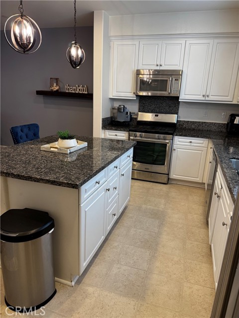 12463 Phoenix Court, Eastvale CA: https://media.crmls.org/medias/ee8b25ca-ffd5-4658-8397-52cc09b0b4ea.jpg