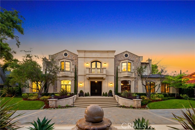 Newly built by Mur-Sol Construction, this Robert Tong-designed Arcadia estate exemplifies the highest standard of luxury living. Set on a gated, private circular driveway, surrounded by meticulous landscaping, it has a magnificent entryway with double doors that lead to a soaring domed foyer with a splendid chandelier. A sweeping dual staircase with ornate wrought-iron railings, gleaming white slab marble with contrasting accents, and beautiful millwork welcome you to the stunning interior. Pass through the graceful archways that connect your formal gathering areas, from the fireplace-warmed living room to the dining room that sits under elegant tray ceilings. Multiple windows usher in abundant radiant sun that casts a rich glow on the gorgeous hardwood floors. Intricately detailed French doors, coffered ceilings, custom built-in shelving, and handsome dark wood paneling lend an old-world feel to the home office. An open-plan family area has refreshing views of the shimmering pool through expansive arrays of glass that seamlessly blend indoor/outdoor living. Shake up craft cocktails at the wet bar, or grab your favorite selection from the wine cabinet. An adjacent dining area is ideal for enjoying more casual fare. Expertly crafted for the avid cook, the all-white kitchen is sure to impress. The countertops are marble, there's ample seating at the oversized island, and you'll have a Wolf multi-burner range with double ovens. Among the many other specialized spaces in this incredible residence are a private screening room with a bar and a versatile bonus room suitable for aNewly built by Mur-Sol Construction, this Robert Tong-designed Arcadia estate exemplifies the highest standard of luxury living. Set on a gated, private circular driveway, surrounded by meticulous landscaping, it has a magnificent entryway with double doors that lead to a soaring domed foyer with a splendid chandelier. A sweeping dual staircase with ornate wrought-iron railings, gleaming white slab marble with contrasting accents, and beautiful millwork welcome you to the stunning interior. Pass through the graceful archways that connect your formal gathering areas, from the fireplace-warmed living room to the dining room that sits under elegant tray ceilings. Multiple windows usher in abundant radiant sun that casts a rich glow on the gorgeous hardwood floors. Intricately detailed French doors, coffered ceilings, custom built-in shelving, and handsome dark wood paneling lend an old-world feel to the home office. An open-plan family area has refreshing views of the shimmering pool through expansive arrays of glass that seamlessly blend indoor/outdoor living. Shake up craft cocktails at the wet bar, or grab your favorite selection from the wine cabinet. An adjacent dining area is ideal for enjoying more casual fare. Expertly crafted for the avid cook, the all-white kitchen is sure to impress. The countertops are marble, there's ample seating at the oversized island, and you'll have a Wolf multi-burner range with double ovens. Among the many other specialized spaces in this incredible residence are a private screening room with a bar and a versatile bonus room suitable for a gym or recreation den. Your primary bedroom is an opulent retreat, featuring a sunlit seating area with a two-sided fireplace and a must-see wardrobe room. Pamper yourself in the ensuite complete with dual vanities, a generously sized frameless-glass rainfall shower, and a soothing, free-standing soaking tub. You'll also have a private sauna. The extended tiled patio offers nearly endless entertaining options surrounding a refreshing pool with a swim-up bar for thirsty guests, a waterfall feature, and a translucent spa. There's a built-in kitchen with a beverage fridge for weekend cookouts and a fire pit to chase away the chill. A very long list of the benefits you'll enjoy with this impeccable abode includes a private tennis court. Its optimal location gives you easy access to shopping, dining, the Los Angeles Arboretum and Botanic Garden, downtown Arcadia.