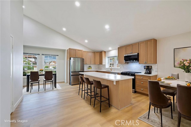 Totally Remodeled home Redesigned with wide open floor plan and vaulted ceilings.