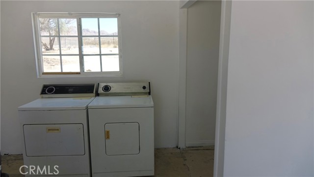 Laundry room inside garage