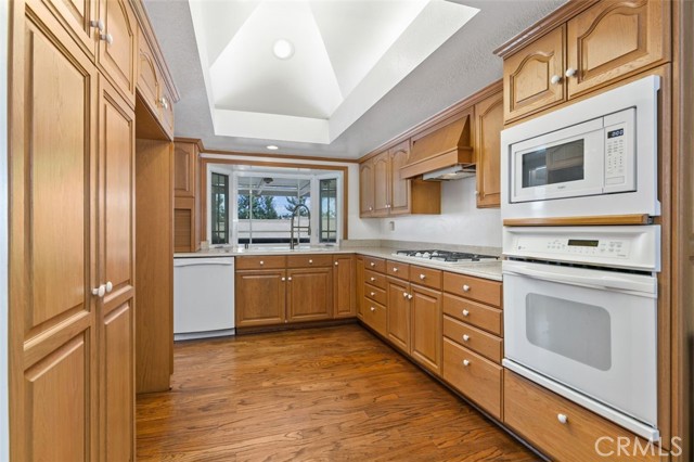 Kitchen overlooking the Pool and built in BBQ