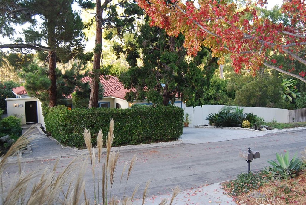 Welcome to this fantastic opportunity in an amazingly sought after neighborhood in Malaga Cove! This 3 BR/2 BA Vintage 1947 home on nearly 1/4 acre is lushly landscaped with an undeveloped large side yard offering numerous expansion opportunities. Home is move-in ready now while buyer is exploring all the options! Home has 2 fireplaces, three patios, wrap around balcony, spacious living room, large family/great room, formal dining room. Incredible amount of storage throughout this home. Cozy updated kitchen with granite countertops and newer appliances.  Great garden views from every room and a peek-a boo ocean view from Living Room.  The private location is a short walking distance to historic Malaga Cove Plaza with Post Office, bank, market, shops and restaurants.  Walk 2 blocks to historic Malaga Cove Library.  Palos Verdes Golf Club, Tennis Club, and Beach Club are all nearby. 
NOTE:  This is a Trust sale and as such all property conditions and representations must be confirmed by the Buyer. This property is located in a PVE peacock historical zone where a reasonable presence of our fine feathered friends will be protected by our City.