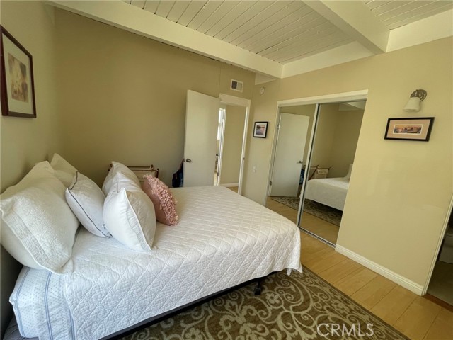 2nd bedroom on second level with mirrored closets.