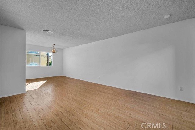 As you enter this Redonod Beach Townhome, you can seen the living room and dining area