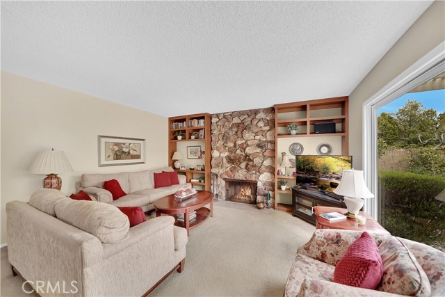 Spacious Family Room that Includes Crackling Fireplace