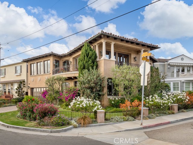 2104 Circle Drive Hermosa Beach, California Grand opportunity to own on a premiere and quiet address by the beach! Circle Drive is a one of a kind in the Sand Section of Hermosa Beach. It is wonderfully located two blocks from the sand, between the Hermosa and Manhattan Beach Pier, walking distance to Marthas for breakfast, and The Bottle Inn for dinner. A snack at the Green Store is a quick hop, skip, and a jump. Perfect Southbay location!
This traditional and classic beauty offers 4648 SQ FT of well laid out and usable living space—Ocean Views from the grand living space, kitchen, and decks. The gourmet kitchen offers a sub-zero refrigerator, warming drawer, two dishwashers, Viking wine cooler surrounded by a large countertop for added entertaining. Venetian plaster in the formal dining and powder room. Five spacious bedrooms, with three on the same entry-level, and two on the bottom level opening up to a large media or playroom. Mike Davis build and Doug Leach Design. Also, 3 zone AC systems and a new driveway. New front yard railing, custom shutters throughout, and hardwoods. To end your day, enjoy a new custom-built rooftop deck that offers a fireplace, BBQ, eating area, and beautiful planters while relishing in calming panoramic Ocean and Sand Views from Malibu to Palos Verdes.