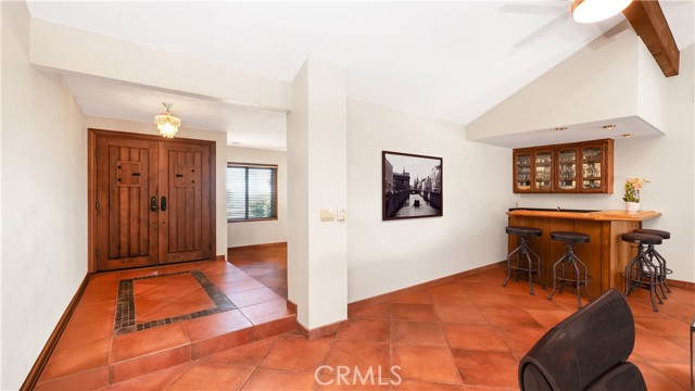 Family room wet bar virtually painted and staged