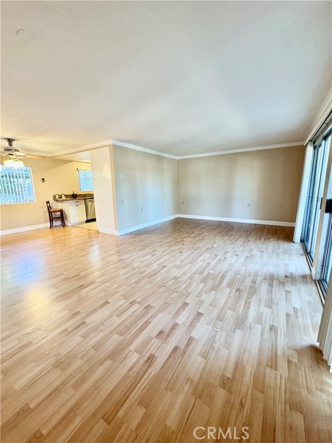 Expansive living room with plenty of space to comfortably accommodate all your furniture and more.