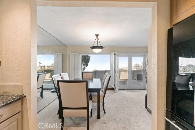 Formal dining with large picture windows to enjoy your sunset views.