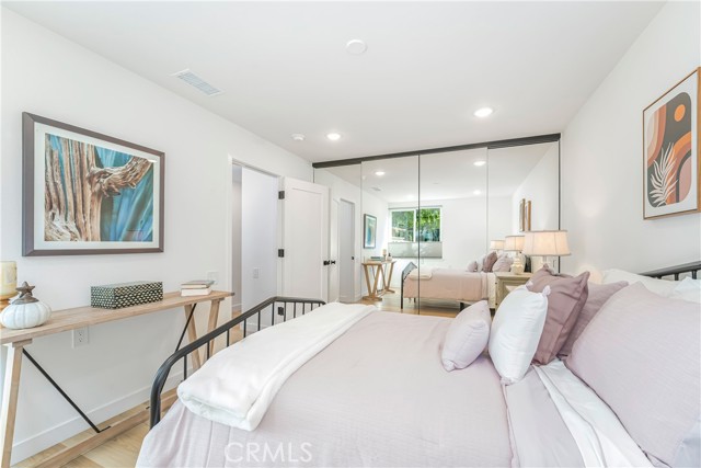 Large bedroom with lots of closet space and organizer, recessed lights in the room and in the closet as well as ceiling fan pre-wire.