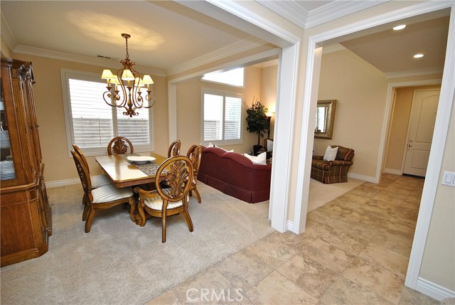 Formal Dining Room with Lovely Light Fixture