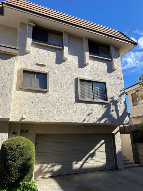 Attached garage provides direct access.