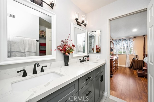 Double-sink vanity provides individual space.
