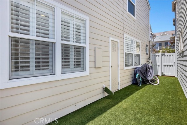 Large side yard with turf