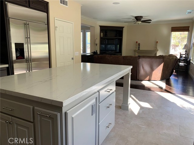 From kitchen looking out to the family room, with the pool beyond.