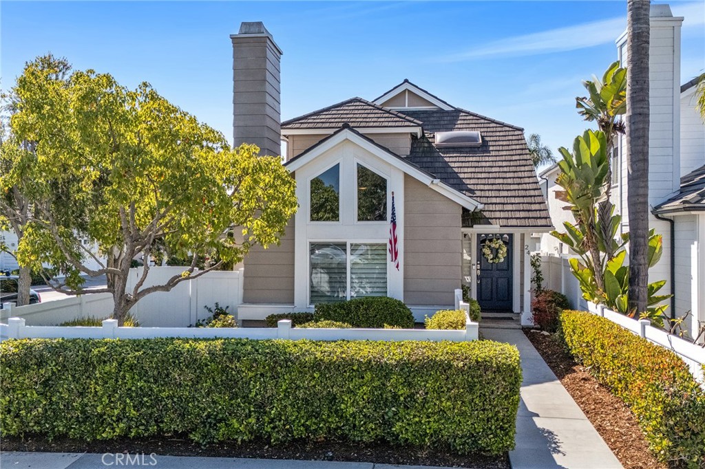 Experience the charm of coastal living in the desirable Beacon Hill neighborhood, where ocean breezes are a daily delight. This inviting home welcomes you with its soaring cathedral ceilings in the living room, creating an open and airy feel, while the crushed glass fireplace adds a cozy touch. The adjacent dining room comfortably seats eight, perfect for gatherings. The updated kitchen features white shaker cabinets, stainless steel KitchenAid appliances, a sleek white quartz countertop, and a designer Blanco sink. A breakfast bar connects the kitchen to the family room, offering a casual dining space and easy access to outdoor entertaining through a sliding door, leading to a BBQ-friendly backyard. The attached garage provides direct access and includes built-in cabinets, as well as space for a washer and dryer. A large powder room completes the lower level. Upstairs, the primary bedroom offers vaulted ceilings, ample natural light, a walk-in closet, and a ceiling fan. The remodeled ensuite bathroom boasts a spacious walk-in shower with double shower heads, built-in seating, and dual vanities. Two additional guest rooms share a full bath. Additional updates include a newer roof, HVAC system, complete PEX repiping, wood laminate flooring downstairs, and upgraded carpet upstairs. Dual-pane windows and white plantation shutters throughout the home offer privacy and energy efficiency. The home is situated on a quiet cul-de-sac, just minutes from John Malcolm Elementary School. The main Beacon Hill pool and tennis courts are conveniently located at the end of the street, adding to the appeal of this fantastic community.