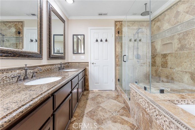 Beautifully remodeled primary bathroom, dual vanity, separate tub