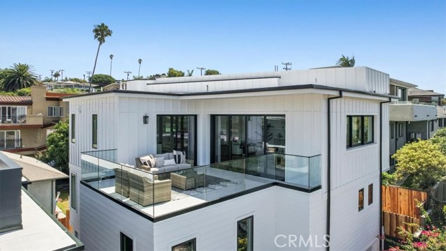 Exterior view of those big windows, and the James Hardie Fiber Cement Board