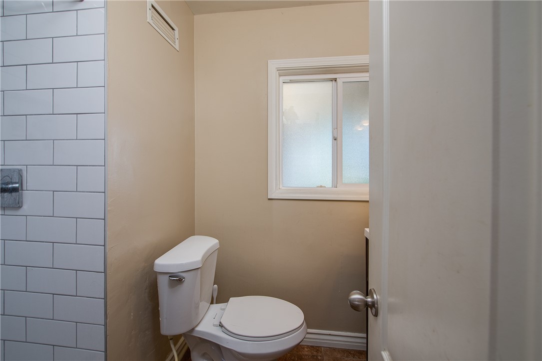 The primary bathroom has a NEW tiled shower and updated vanity.