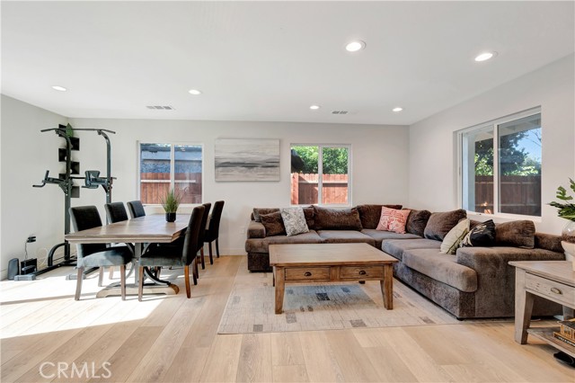 ADU living room with recessed lighting and modern finishes