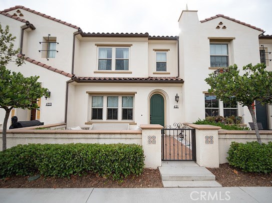 421 La Floresta Drive Brea, California Location, Location, Location! This immaculate town home is ideally located in the master-planned community of La Floresta in Brea and boasts 3 bedrooms and 2.5 baths. This home offers a spacious and open concept design, including a kitchen with beautiful granite counters, stainless appliances, and island with breakfast bar that opens to the adjacent dining area and family room for easy entertaining. In addition to the gated front courtyard perfect for relaxing and alfresco dining, the upstairs master suite also leads to a private, expansive covered balcony. Just a few of the many additional upgrades include epoxy flooring and repainted walls in the 2 car garage, gorgeous neutral floor tile downstairs and high-grade carpeting upstairs, and recessed lighting and plantation shutters throughout. Residents enjoy resort-style community amenities such as a year-round heated swimming pool, clubhouse, playground, barbecue and picnic area - all within close proximity to the new Village at La Floresta shops and restaurants.
