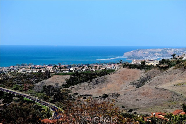 This photo was taken from the balcony and shows the Dana Point Harbor where you can see boats on the water all the time from your new home.