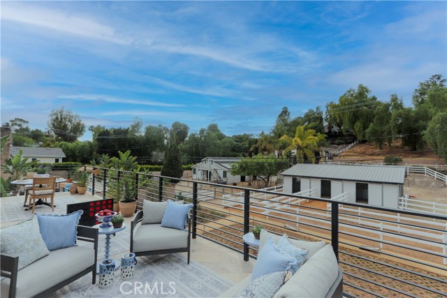Alfresco dining, multiple relaxation and conversation areas make this 630 square foot deck an extension of the living space.