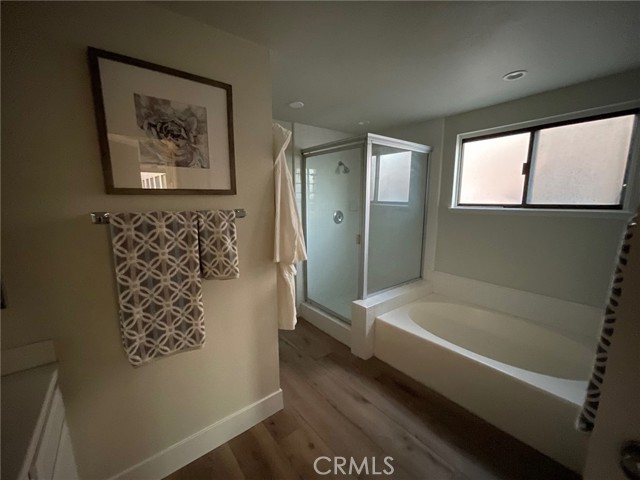 Master Bathroom With Separate Shower and Oval Tub