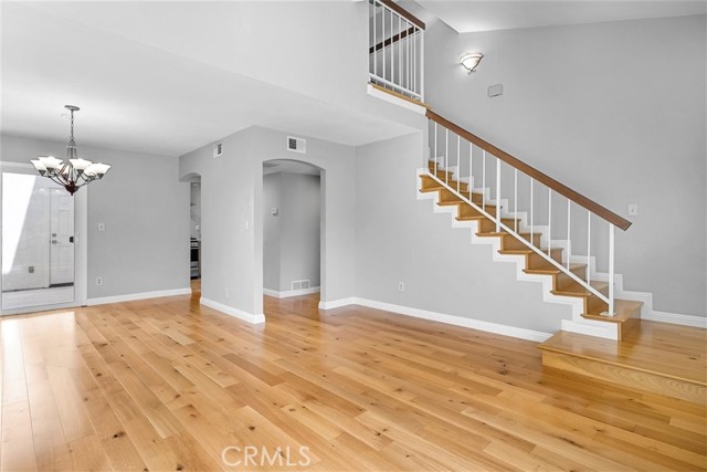 living area looking towards stairs to 2nd floor