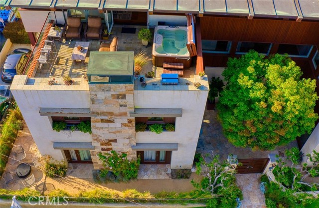 Drone shot of the Deck off third floor living area and bar.  Hard to duplicate in MB Sand Section.