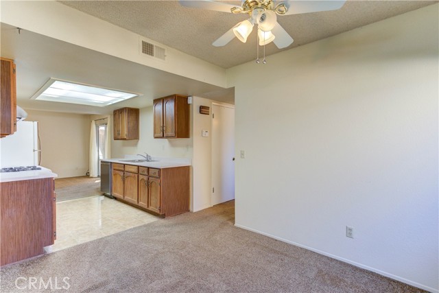 Hallway leads to both bedrooms and bathrooms