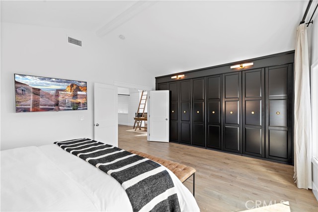 Additional view of Primary Bedroom with large built-in closet space.