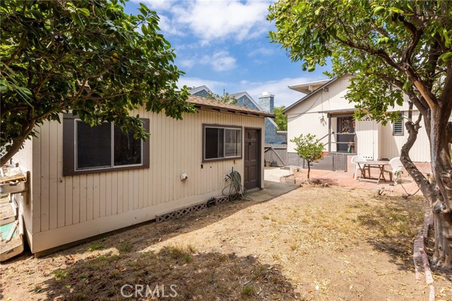 Rear of home from back fence lining alley