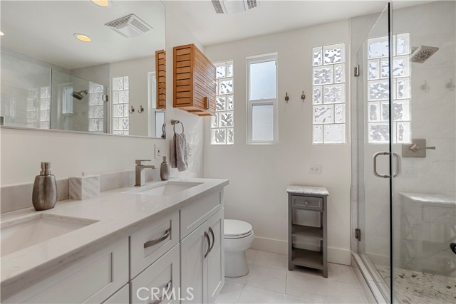 Upper level bathroom with walk in shower