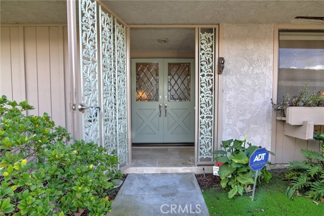 Security gate allows privacy and breezes when the doors are open.